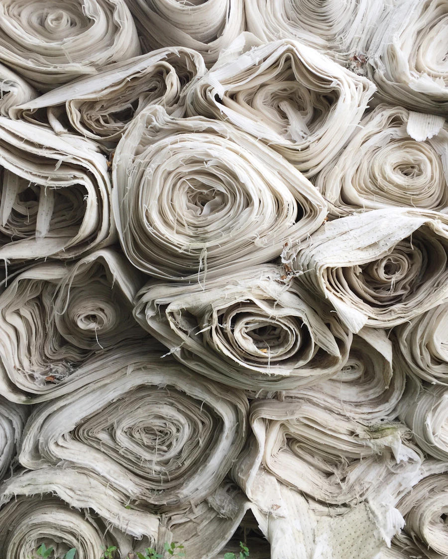 Rolls of undyed white cotton textile
