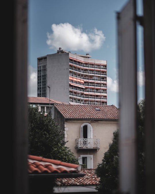 gray and red concrete building during daytime in Agen France