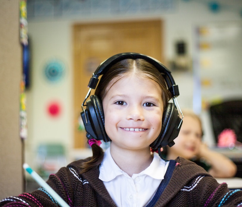 girl wearing black headphones