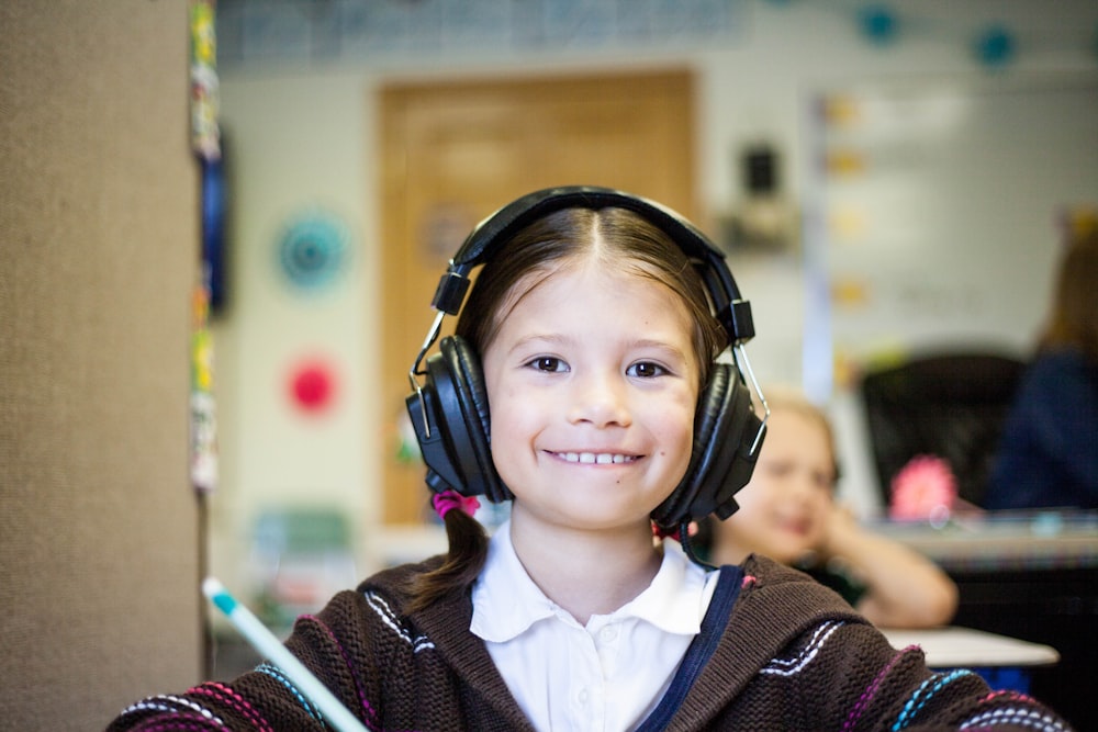 girl wearing black headphones