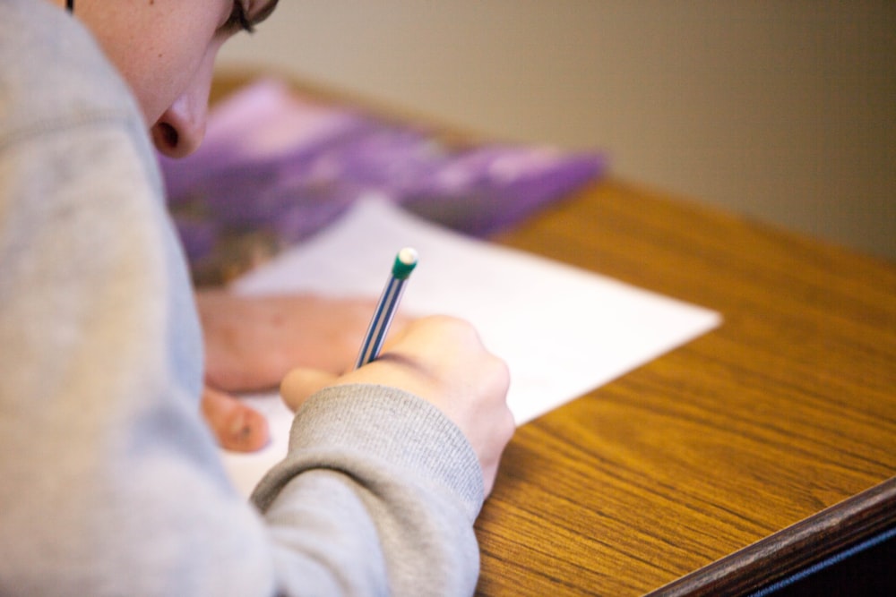 person using pencil