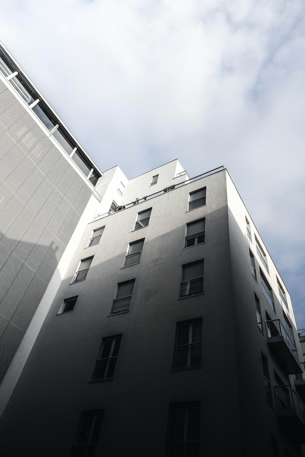 white building under cloudy sky