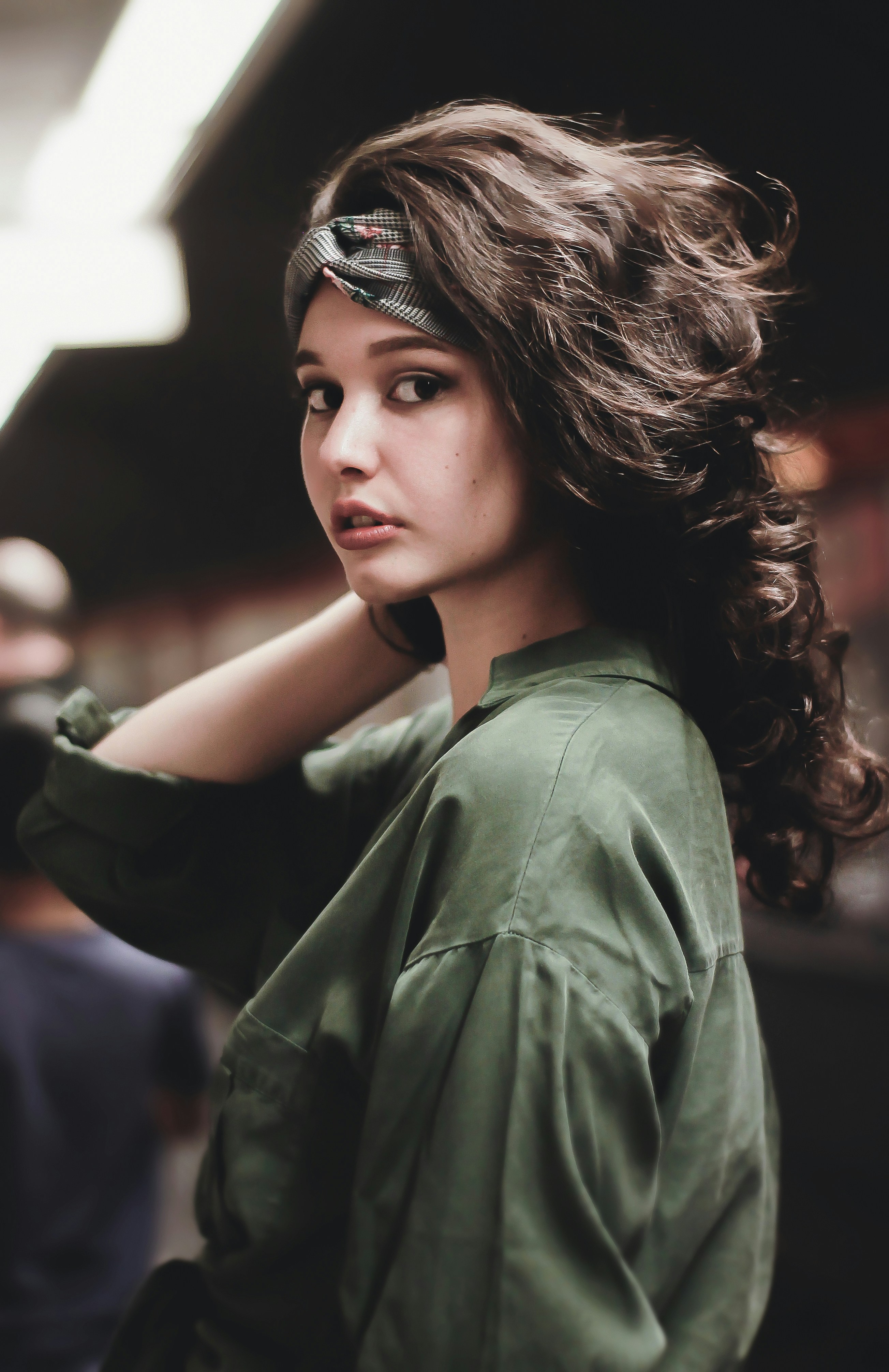 woman holding her hair