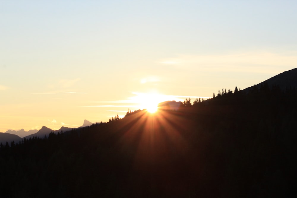 silhouette of mountain during golden hour