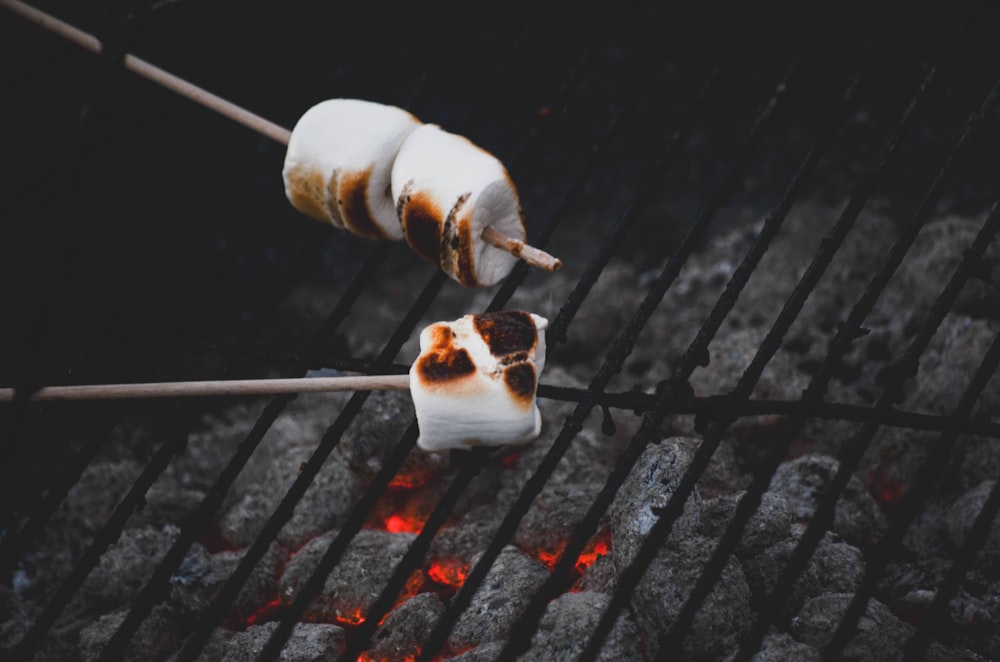 person grilling marshmallows