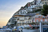 A charming coastal village on the French Riviera, colorful houses stacked against the hillside.