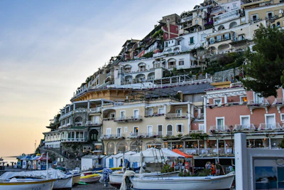 A charming coastal village on the French Riviera, colorful houses stacked against the hillside.