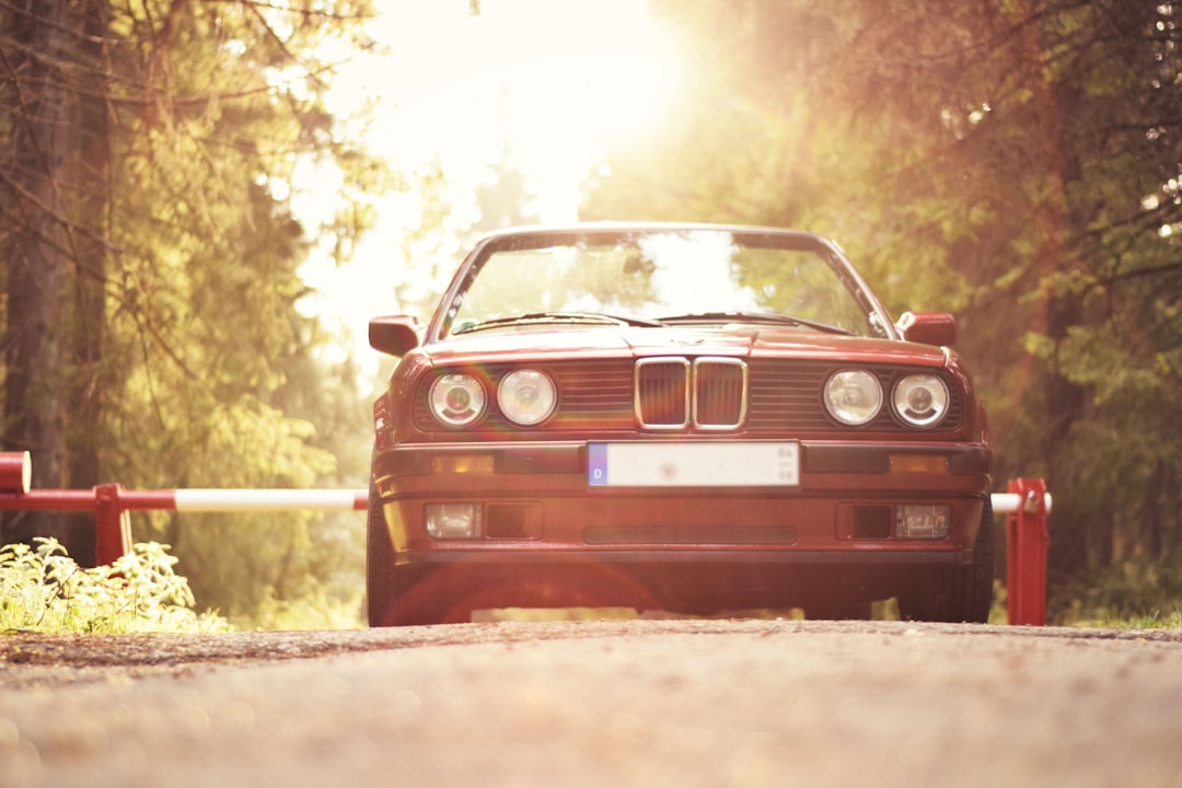 red car traveling on road, Oldtimer