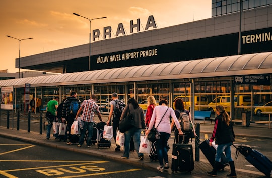 people walking on sidewalk in Prague Ruzyně Airport Czech Republic