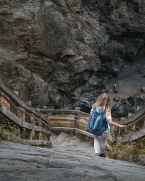 woman walking on bridge