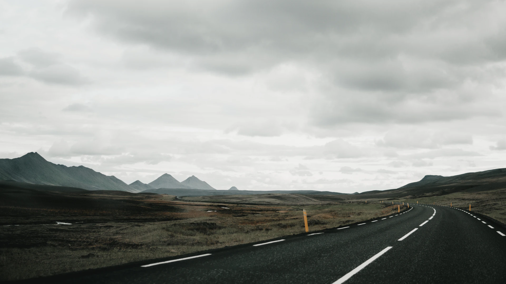 black concrete roadway during daytime