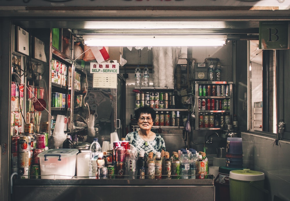 woman sitting in front of label container lot