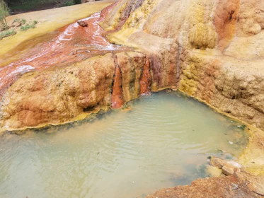 Warm mineral water pools reflecting the soft glow of sunset in Desert Hot Springs.
