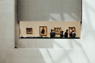people gathering in building during daytime