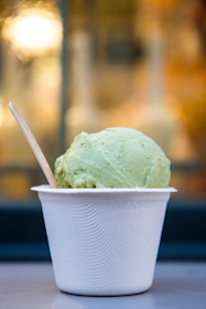 selective focus photo of cup of ice cream