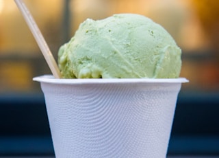 selective focus photo of cup of ice cream