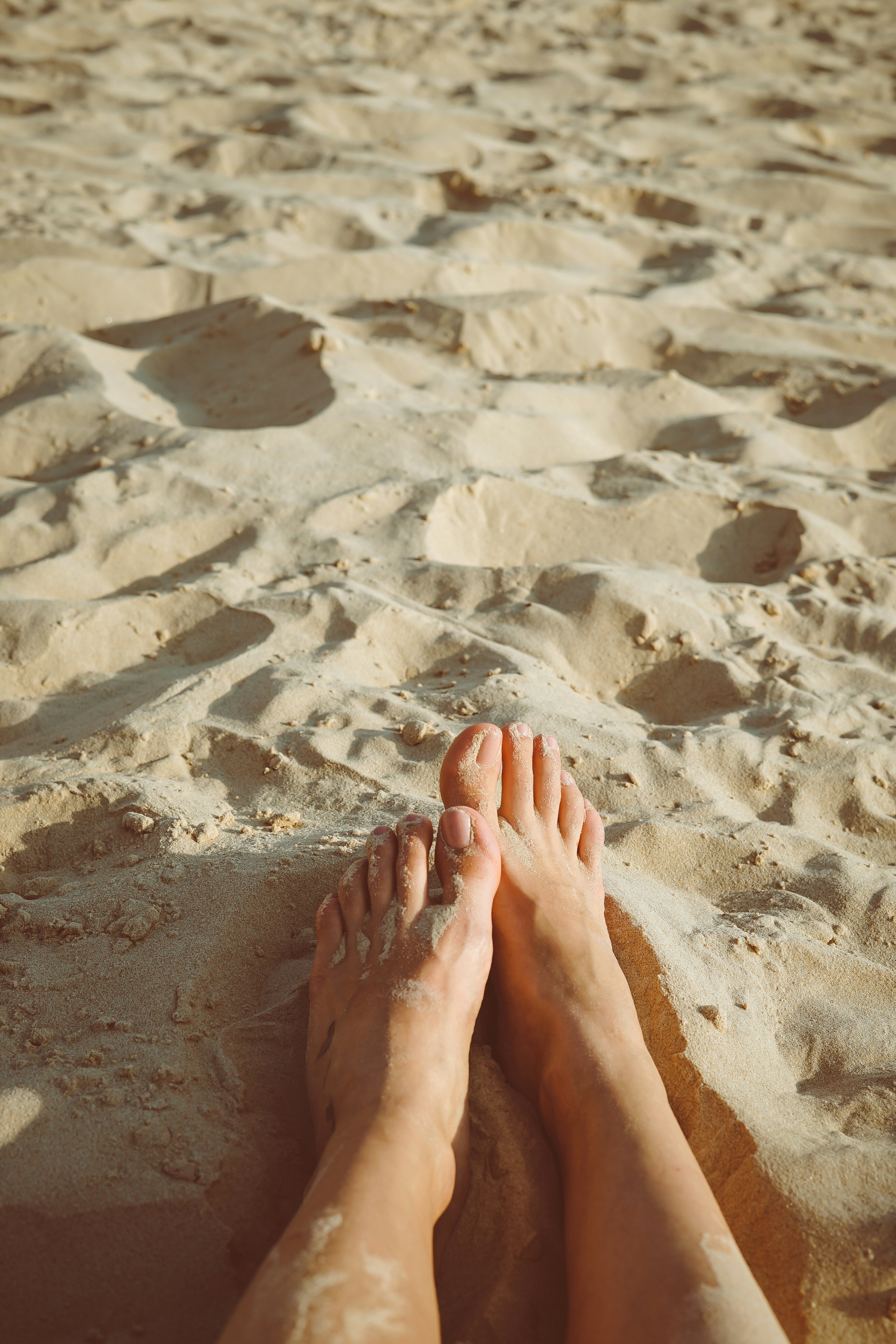 laying on sand