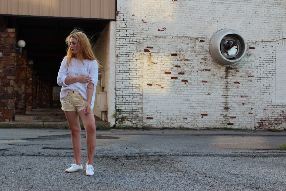 woman standing in front of building