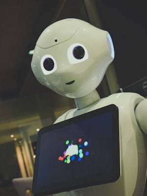 A magnifying glass closely inspecting a photo for signs of AI generation.
