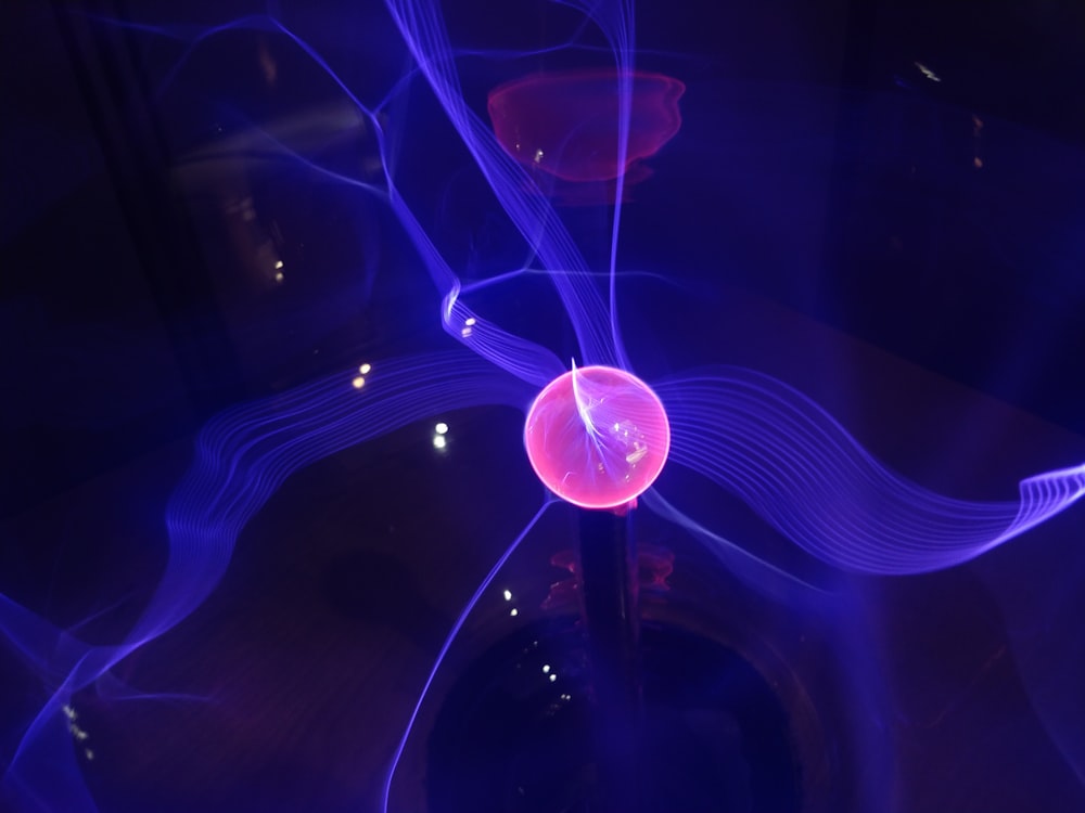 red ball with purple aura digital wallpaper