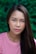 woman in pink crew-neck shirt in closeup photography