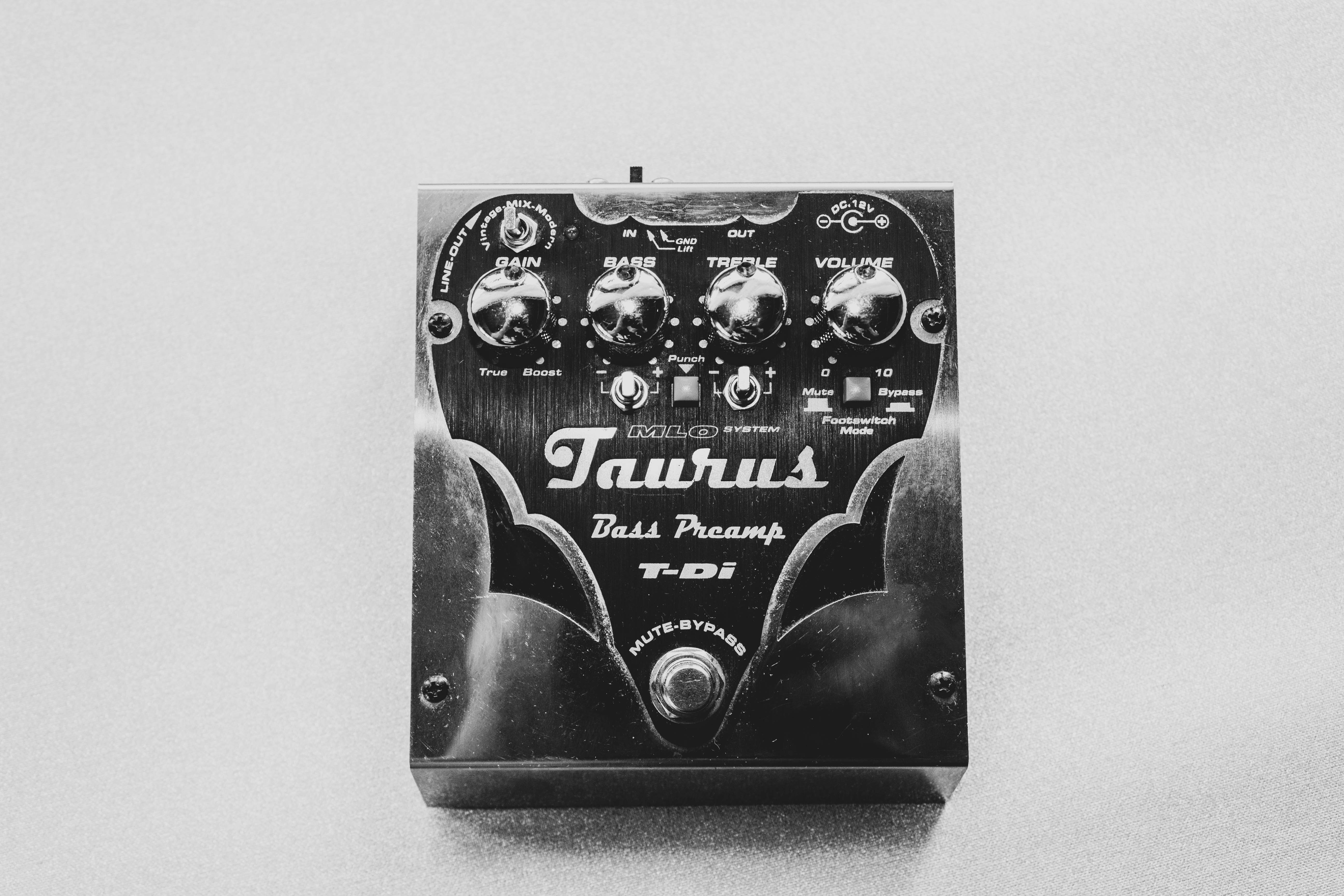 black Taurus T-Di bass preamp on grey surface