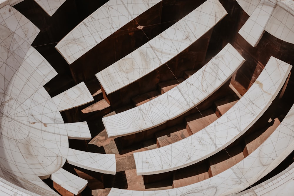 low-angle photography of white and brown concrete building