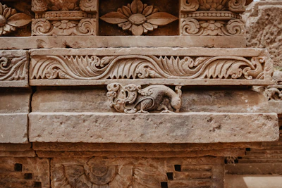 Luxurious wall panel showcasing traditional peacock motifs in stone.