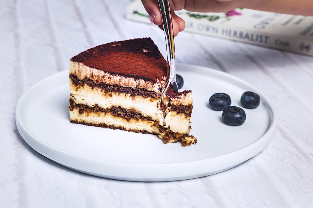 person eating cake