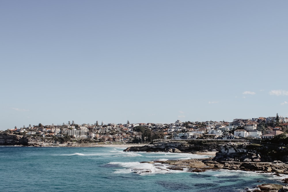 a view of a city from the ocean