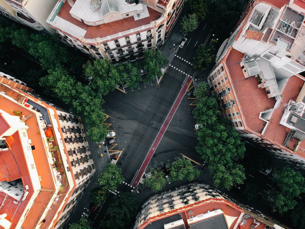 flat lay photography of intersection surrounded by buildings