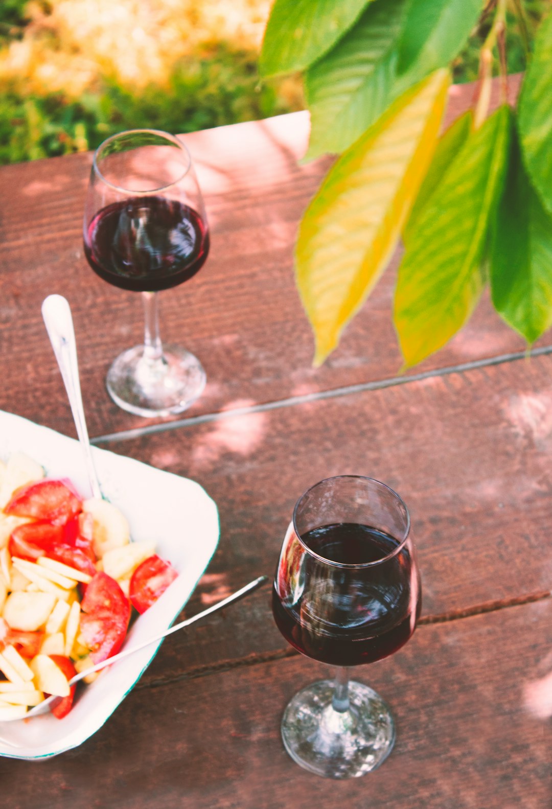 two glasses of wine on table