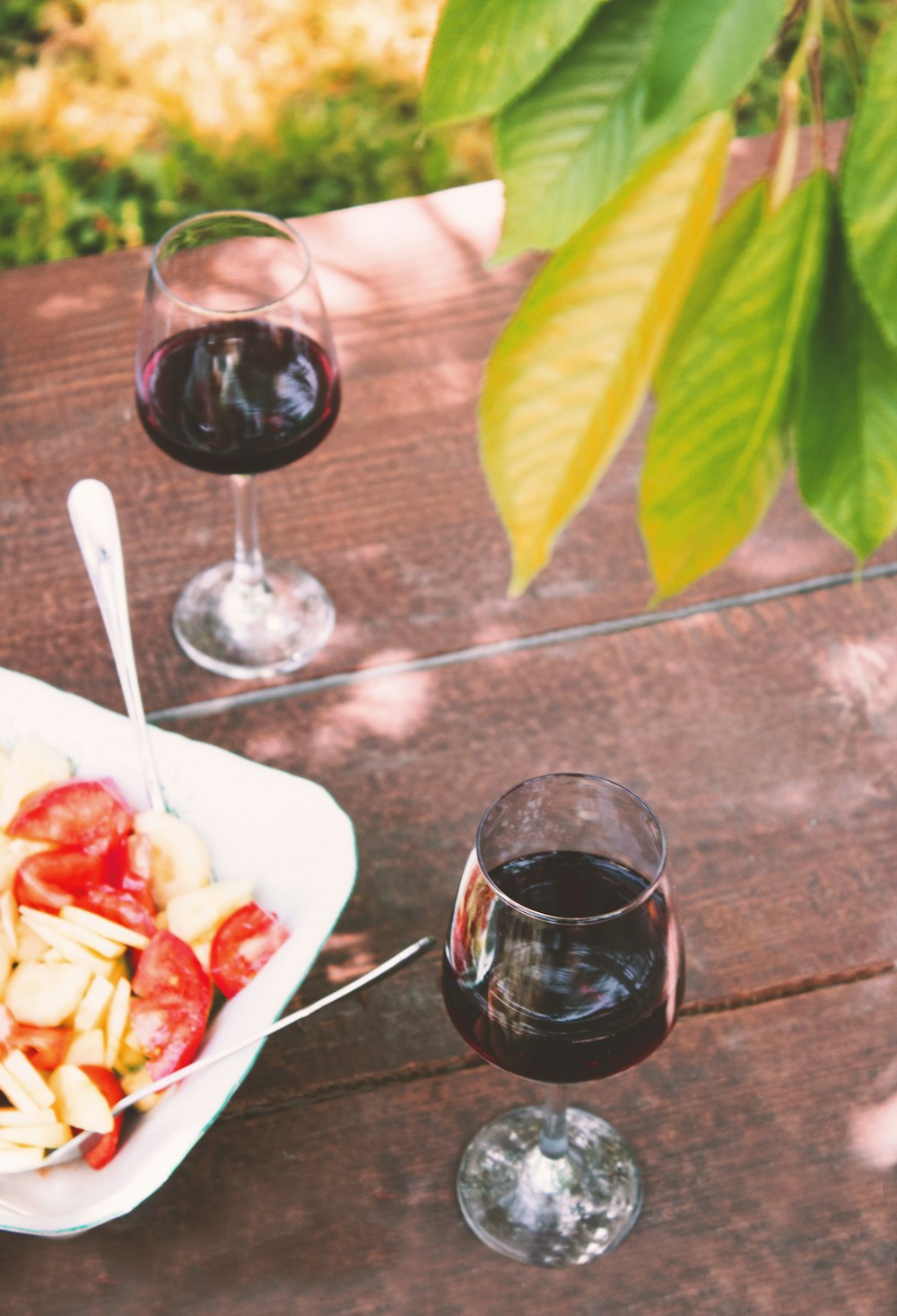 two glasses of wine on table