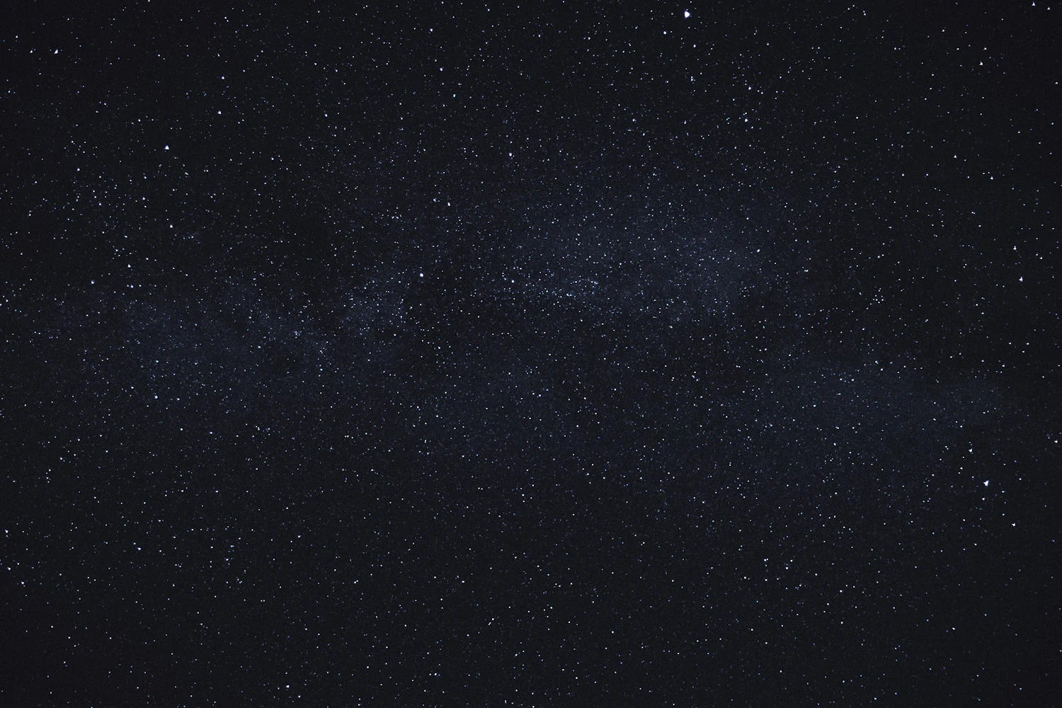 A single bright streak crossing a star-filled night sky