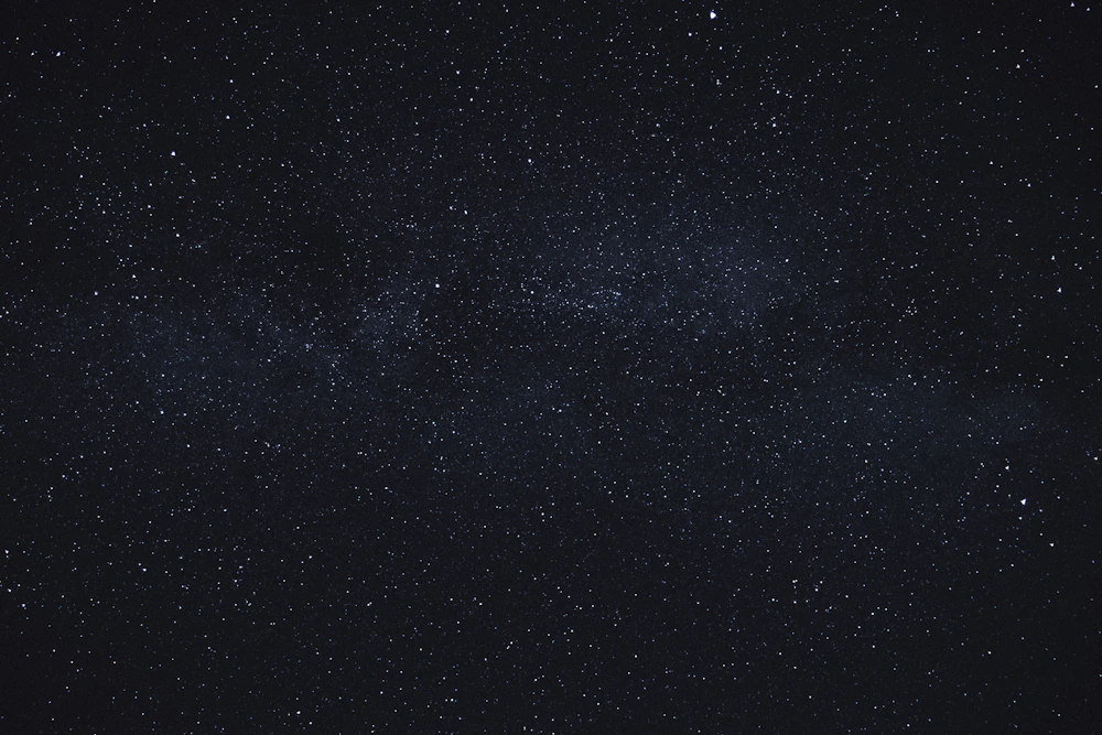 Star field representing astrology and karmic chart analysis