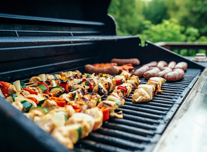 grilled barbecues on black and gray grill