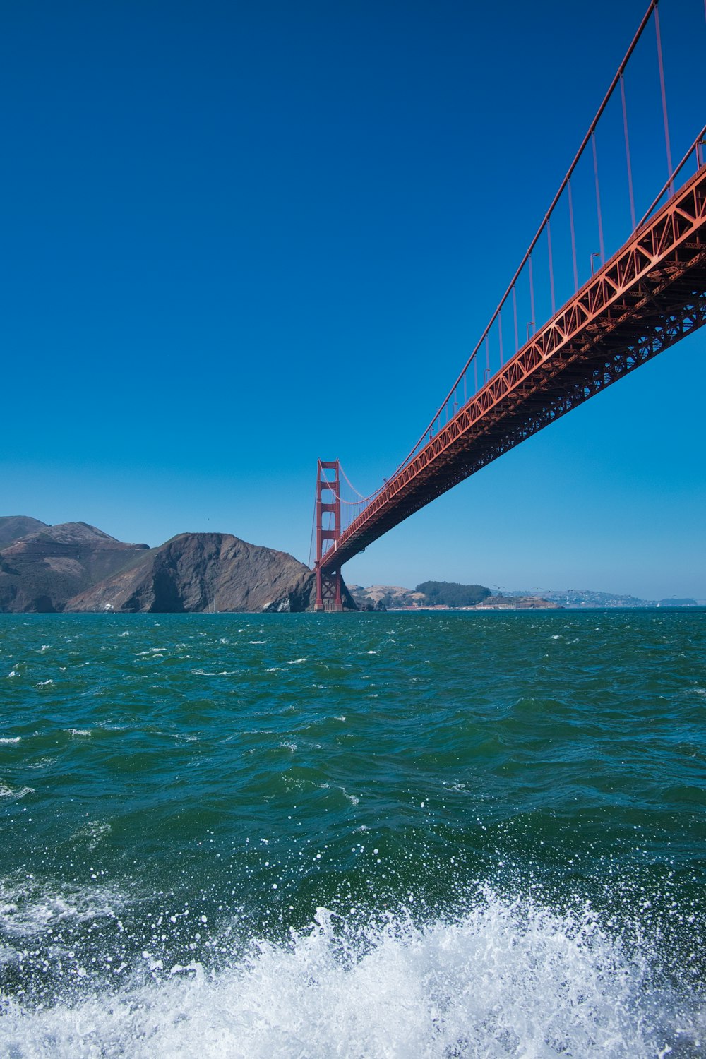 suspension bridge near mountain