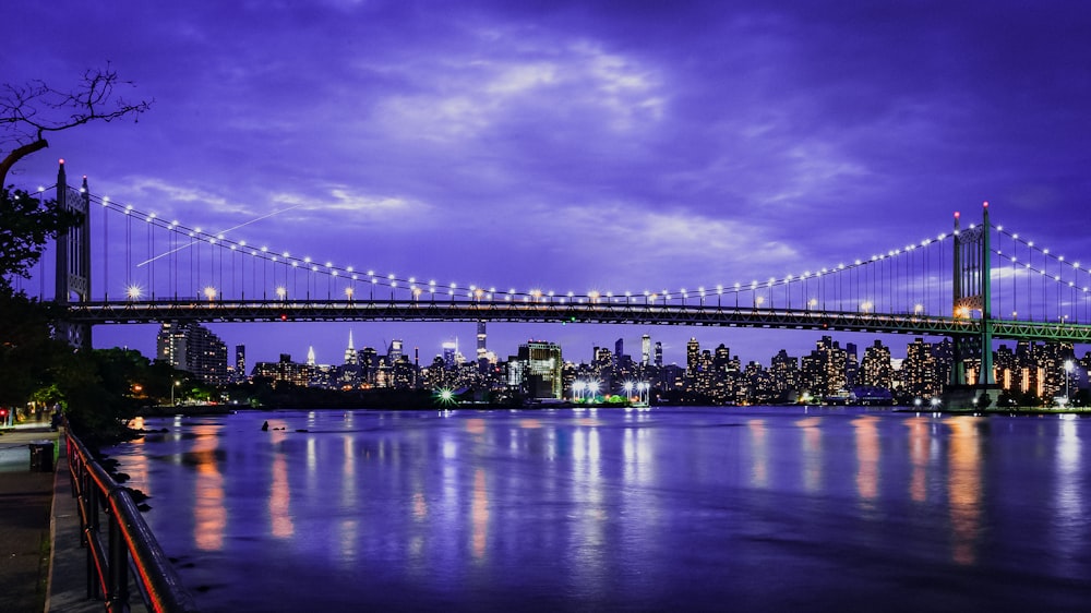 photo of suspension bridge during nighttime