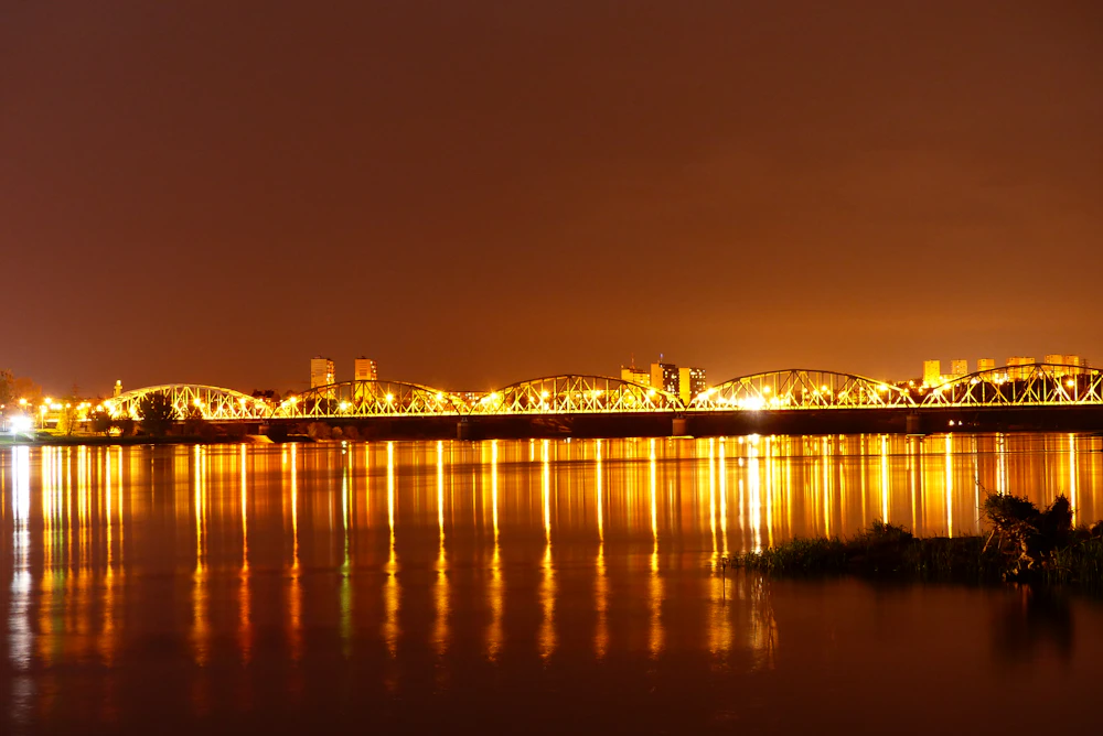 Steel truss bridge over water