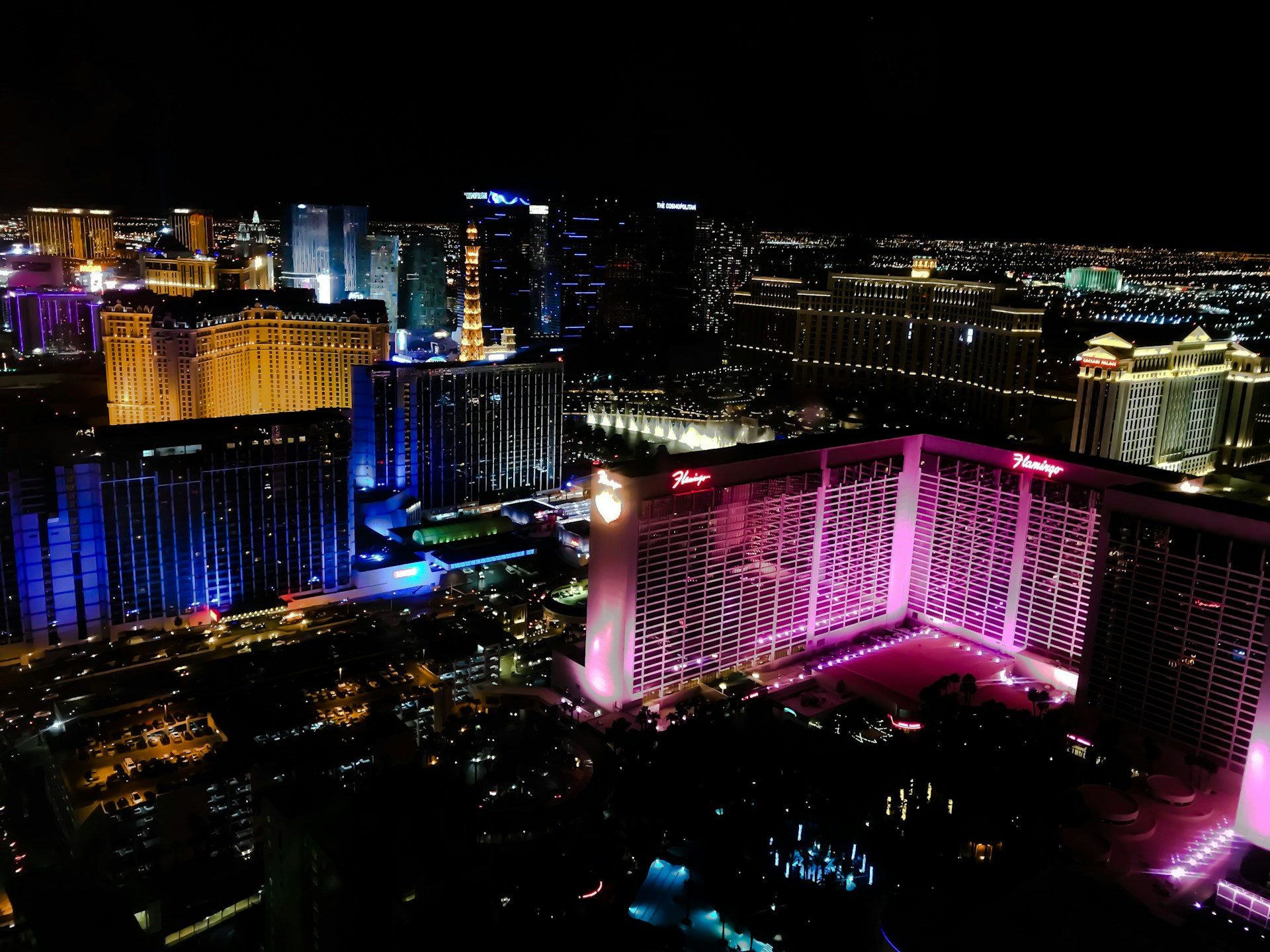 A vibrant oil painting capturing the lively streets of Las Vegas at dusk, with rich colors and dynamic brushstrokes.