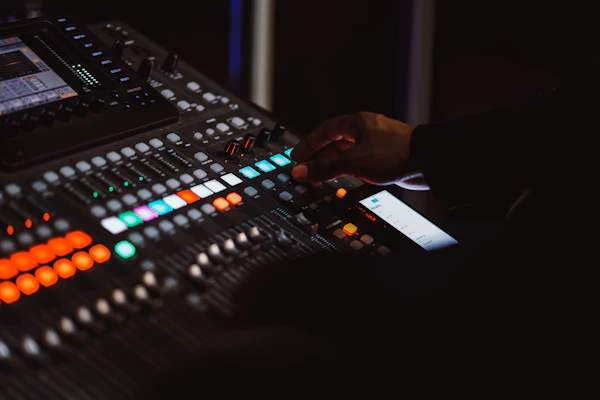 Live production operator at mixing console