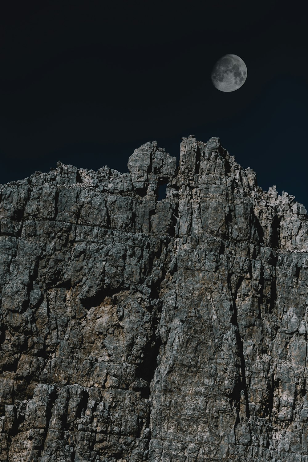 cliff over moon