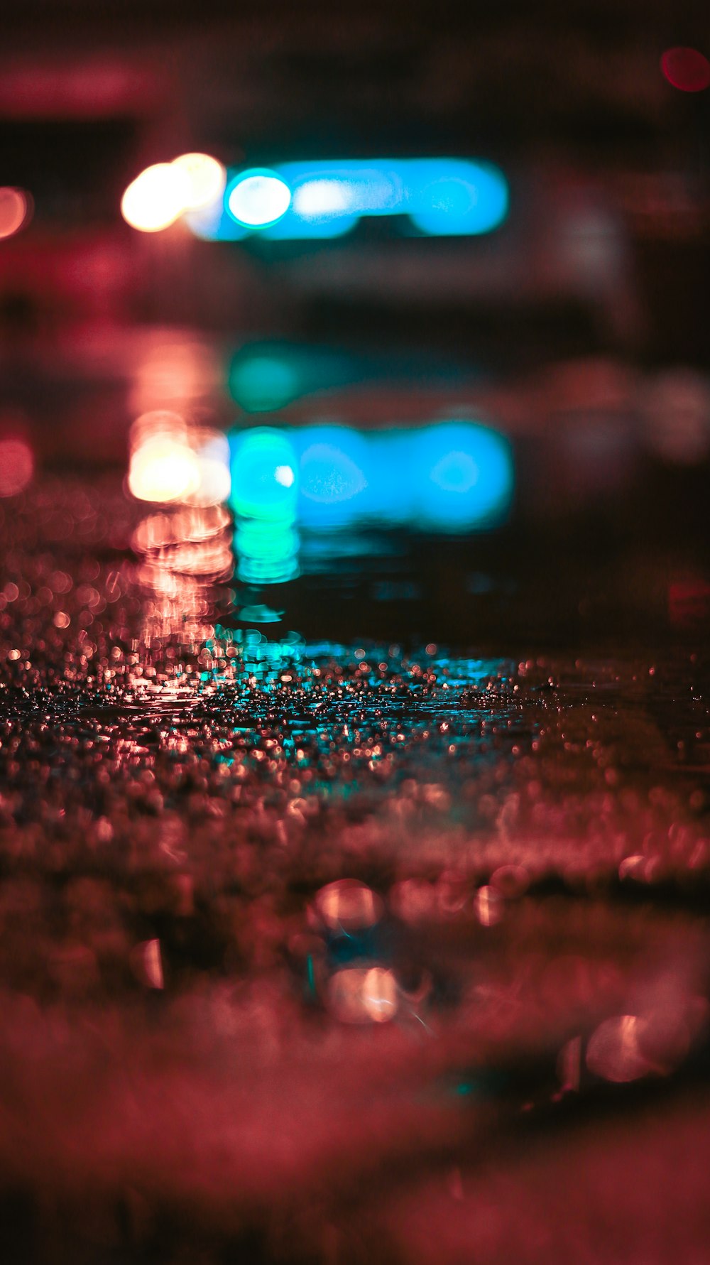 a blurry image of a street with a lot of lights