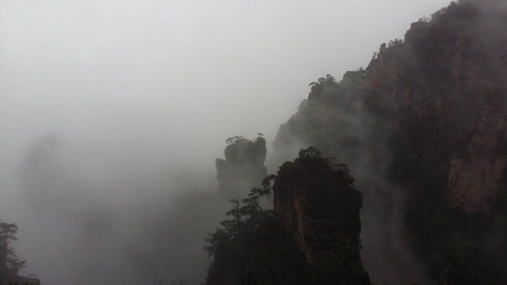 misty rock formation at daytime