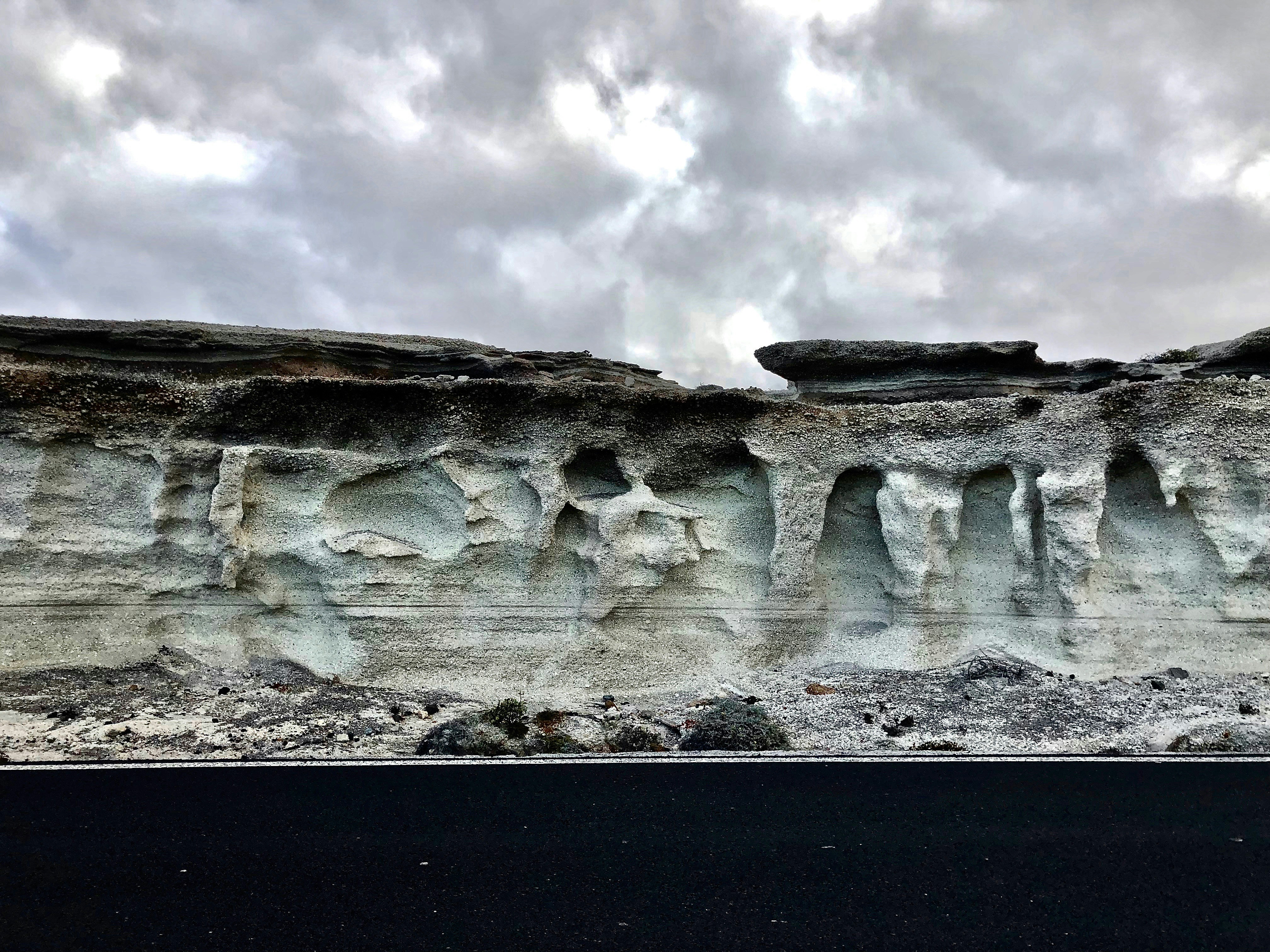 photo of white stone wall