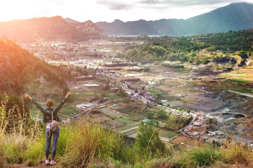 woman standing on mountain