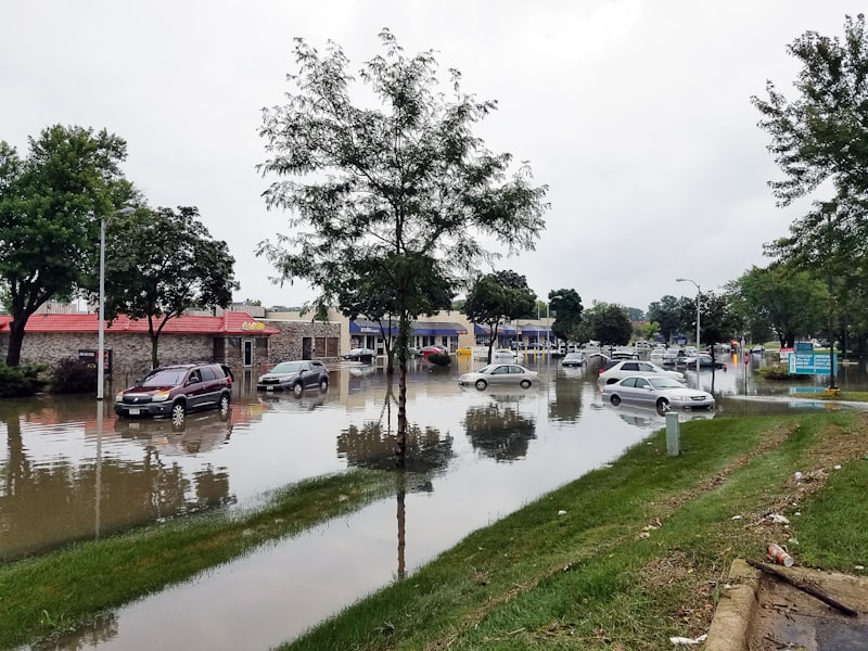 heavy rain, storm clouds, wet streets, raindrops, flooded river