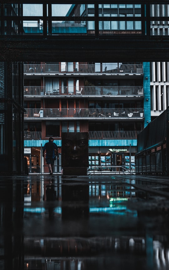 man walking in the hallway in Oslo Norway