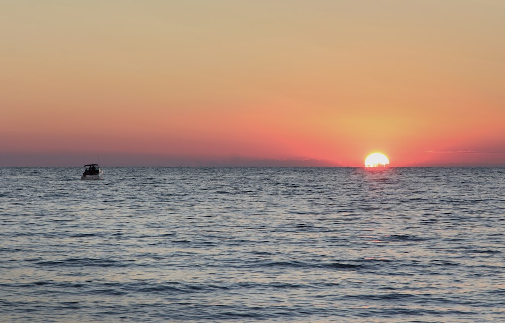 body of water at sunset