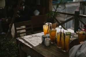 Warm, inviting scene of a family enjoying foleré drinks together outdoors.